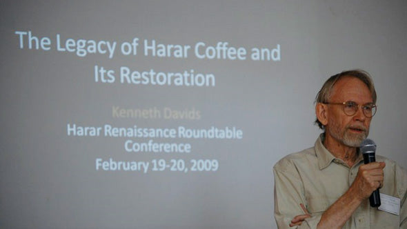 Ken Davids speaking at the Harar Roundtable Coffee Conference Ken Davids of Coffee Review on stage giving a lecture